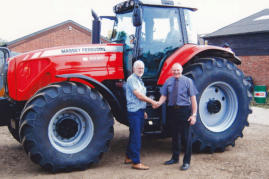 Carlo and Robert have been friends for many years. Carlo's latest tractor is a Massey Ferguson Model 8737.