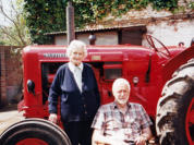 In front of his Nuffield Model 1060 Tractor