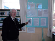 Pointing to a picture of his uncle Carlo, a police officer