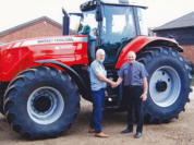 Carlo and Robert have been friends for many years. Carlo's latest tractor is a Massey Ferguson Model 8737.