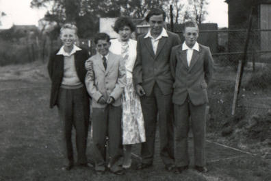 Photograph was taken in 1957. The old Village Hall can just be seen top right.