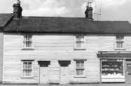 Bank House Chemist on west corner of North Street, High Street, Great Wakering