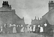 Group of people in Exhibition Lane, Great Wakering.