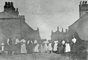 Group of people in Exhibition Lane, Great Wakering.