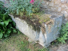 Large ancient sculptured stone trough which was found by local farmers, Bill and John Pavel in the meadow of the existing Wildlife Reserve.