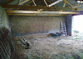 Inside the Cattle Shed. Mark's office is at the ladder end.