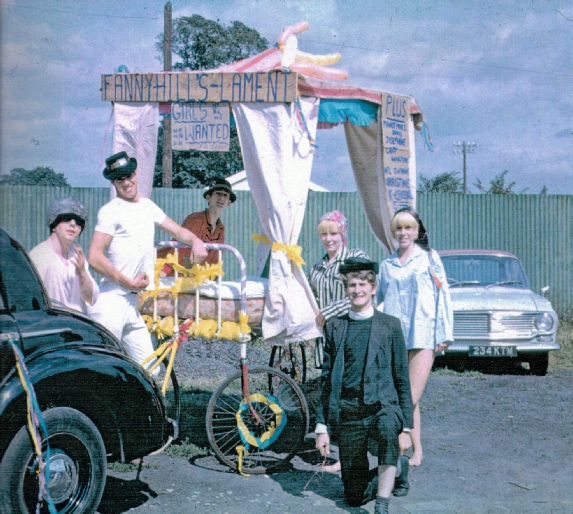 Local Carnival Float in 1965. Left to right in the photograph is John Glen, Barry Burles, Vic Lee, Maureen Osbourne, Leslie Upton and Dave Lee in the foreground.
