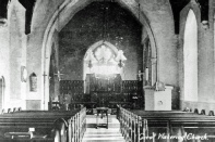 St Nicholas Church, Great Wakering interior showing oil lamps